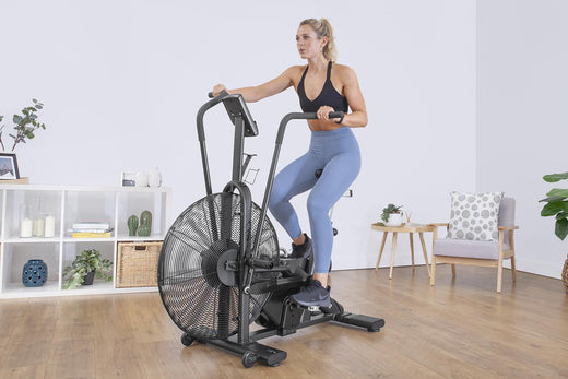  Someone in an intense exercise bike workout 
